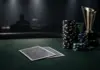Live-Ticket inklusive: Wilson gewinnt das GGMillion$ Winning poker cards, tournament chips and trophy on a green felt table
