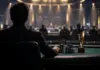 Lukas Pazma holt €65.144 beim Israeli Federation Cup An anonymous poker player celebrates a major tournament victory beside chips and a trophy at a casino final table.