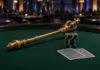 Royal Scepter krönt Andre Winklers Sieg in Rozvadov Golden royal scepter beside poker chips on a final table at a casino tournament